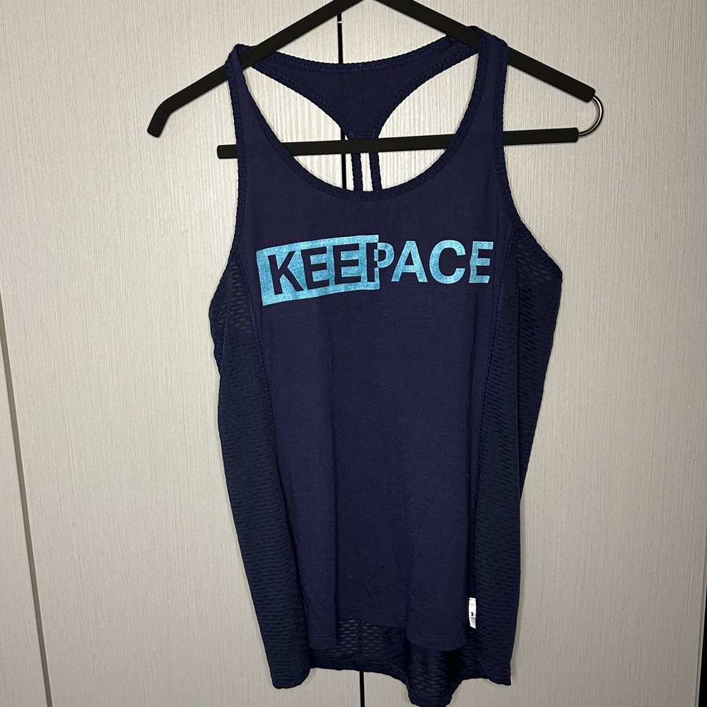Under Armour “keep pace” running tank EUC.